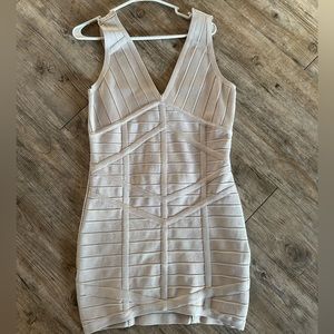 Beige Sleeveless Bandage Dress - Chic and Flattering!